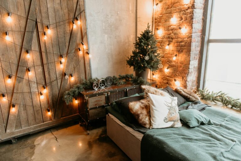 Cozy Lit bedroom with small christmas tree