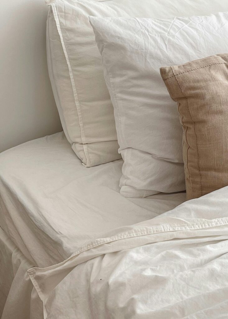 white and beige bedding