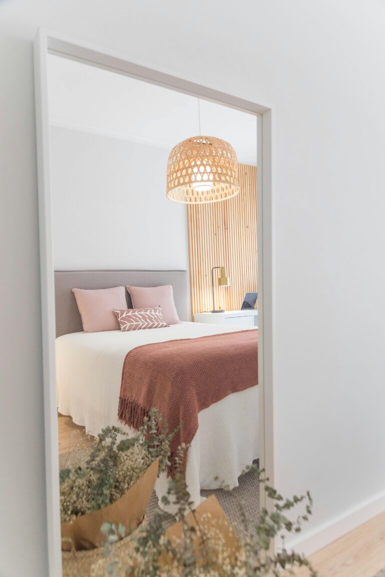 mirror in bedroom to help small bedroom feel organized