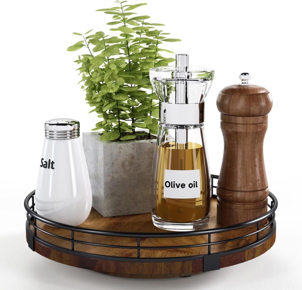 wood susan turn table holding pepper and oil and a plant