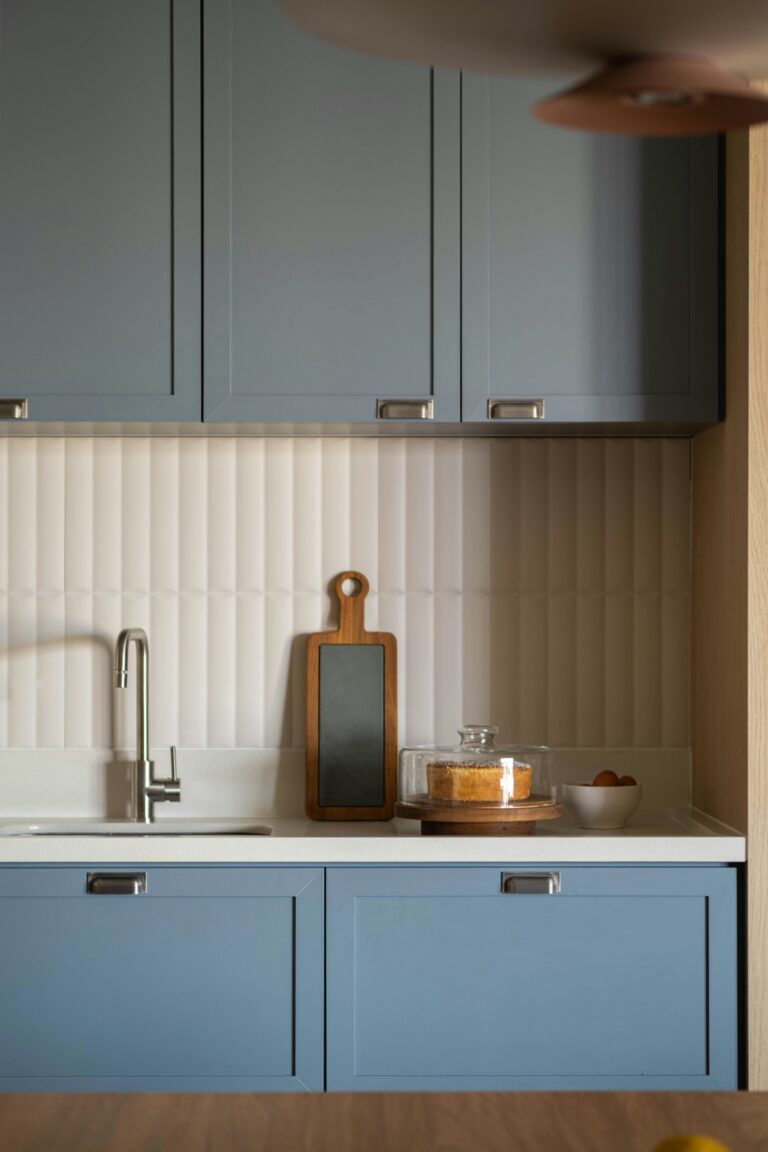 clean blue minimal kitchen that's well organized