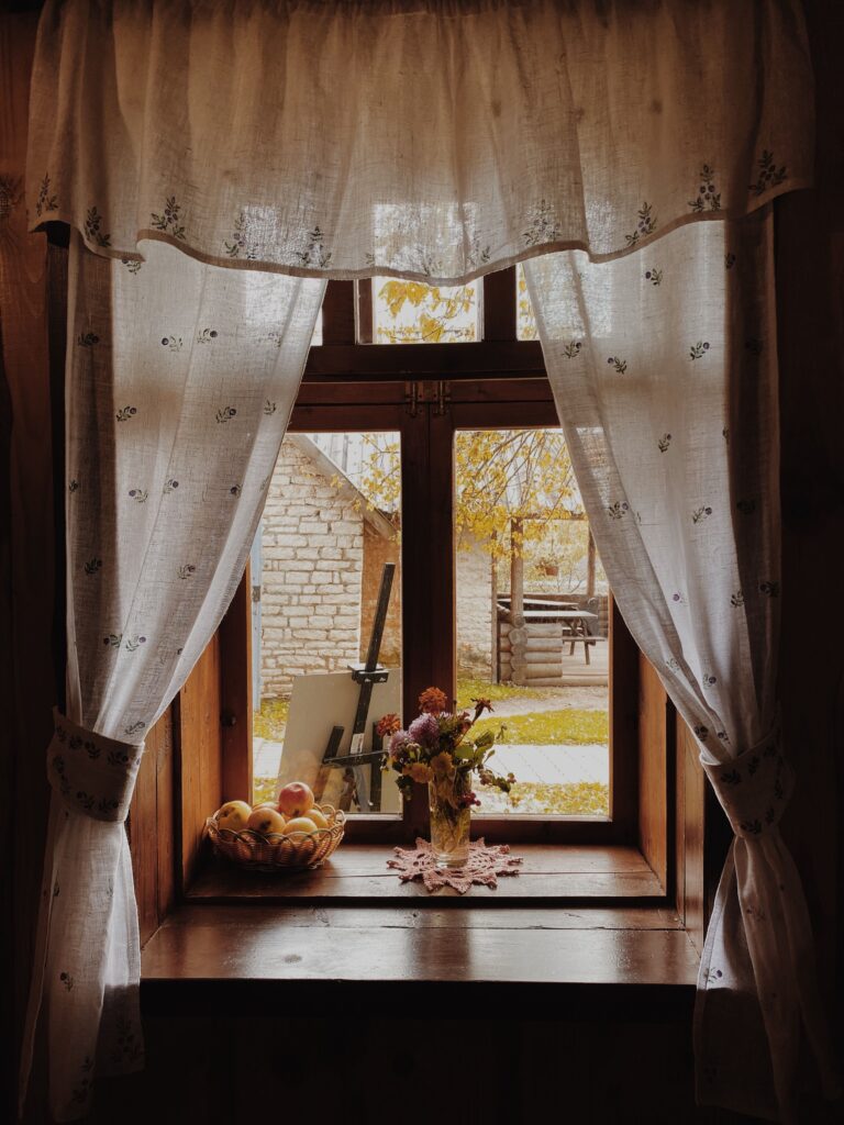 vintage kitchen curtains in a dark kitchen window