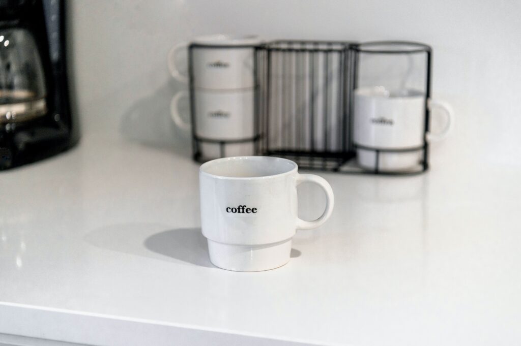 white coffee mugs on kitchen countertop
