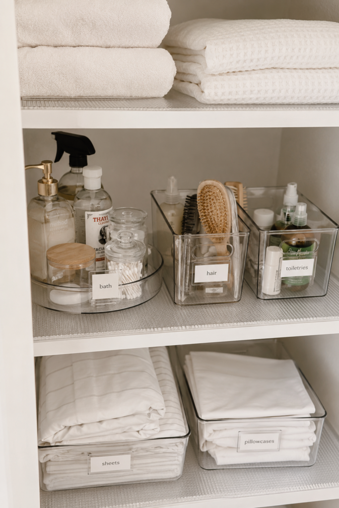 clear shelf liner for linen closet organization ideas with clear bins on shelf