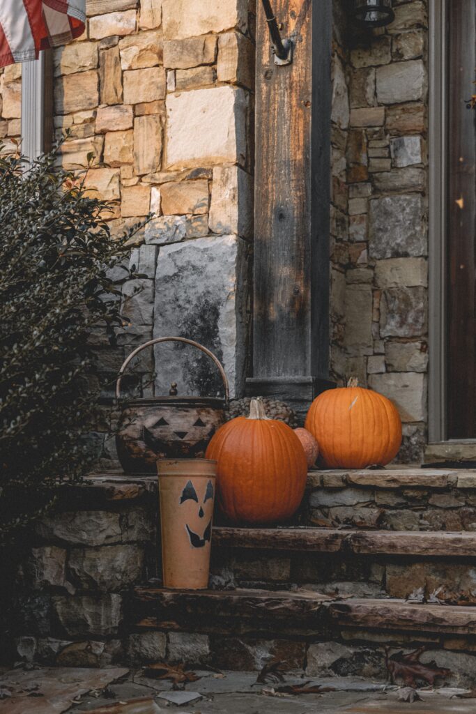 fall front porch decor on stone staircase
